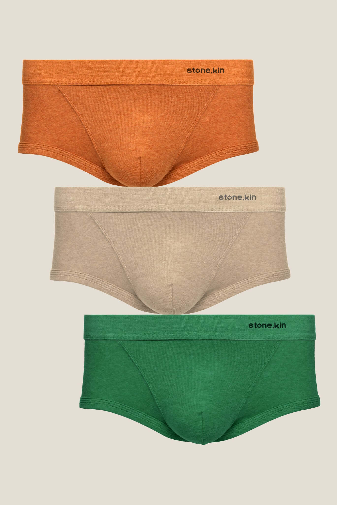 Stonekin Men's Organic Cotton Trunk 3-Pack in Papaya, Sand, and Pandanus colours, designed for comfort and breathability. Ethically made from premium organic cotton.