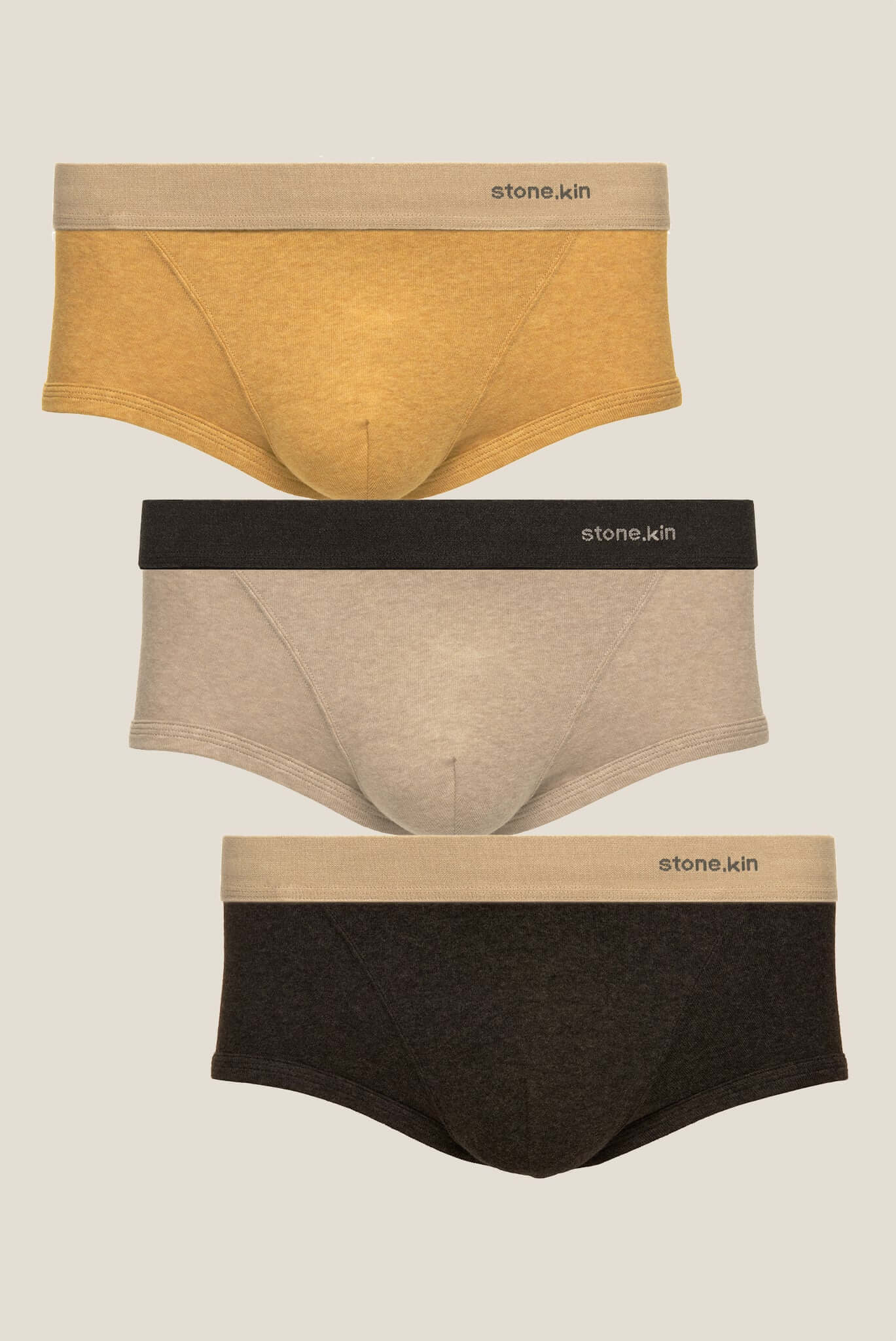 Stonekin Men's Organic Cotton Trunk 3-Pack in Mustard, Sand, and Tar colours, crafted for comfort and breathability. Ethically made from premium organic cotton.