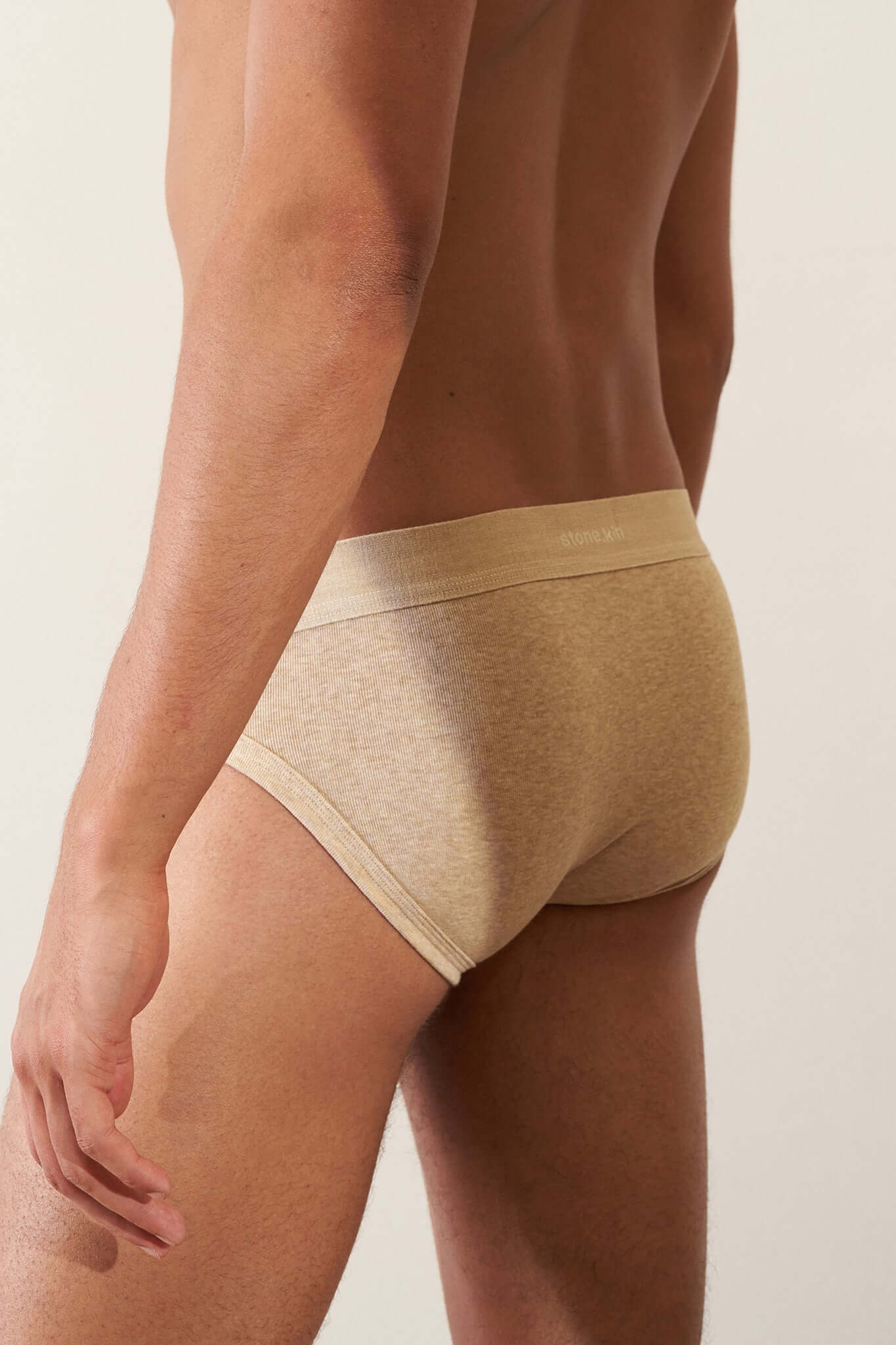 Stonekin Men's Organic Cotton Brief 3-Pack in Papaya, Sand, and Pandanus colours, featuring a classic fit in soft organic cotton.
