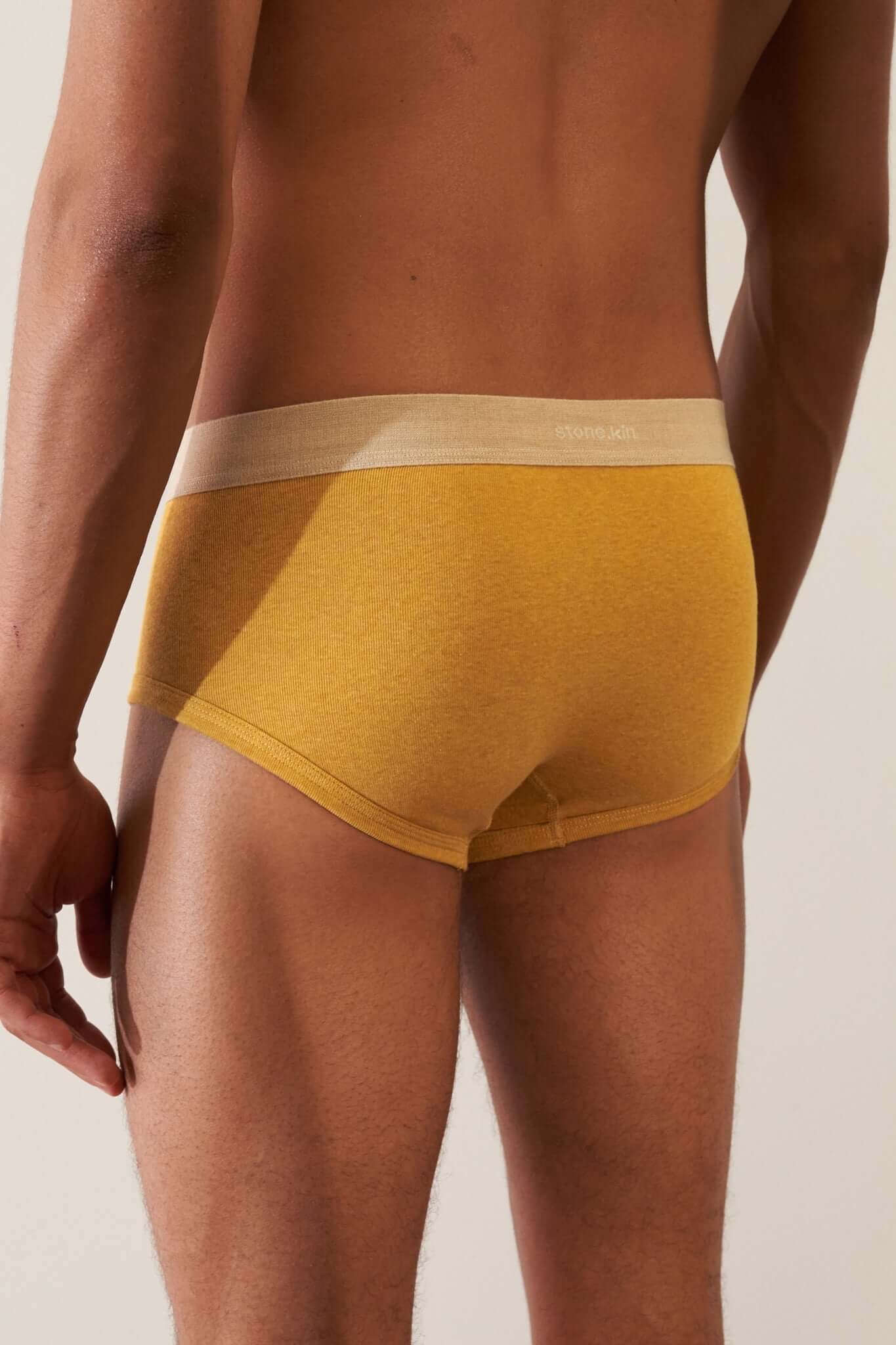 Stonekin Men's Organic Cotton Trunk 3-Pack in Mustard, Sand, and Tar colours, crafted for comfort and breathability. Ethically made from premium organic cotton.