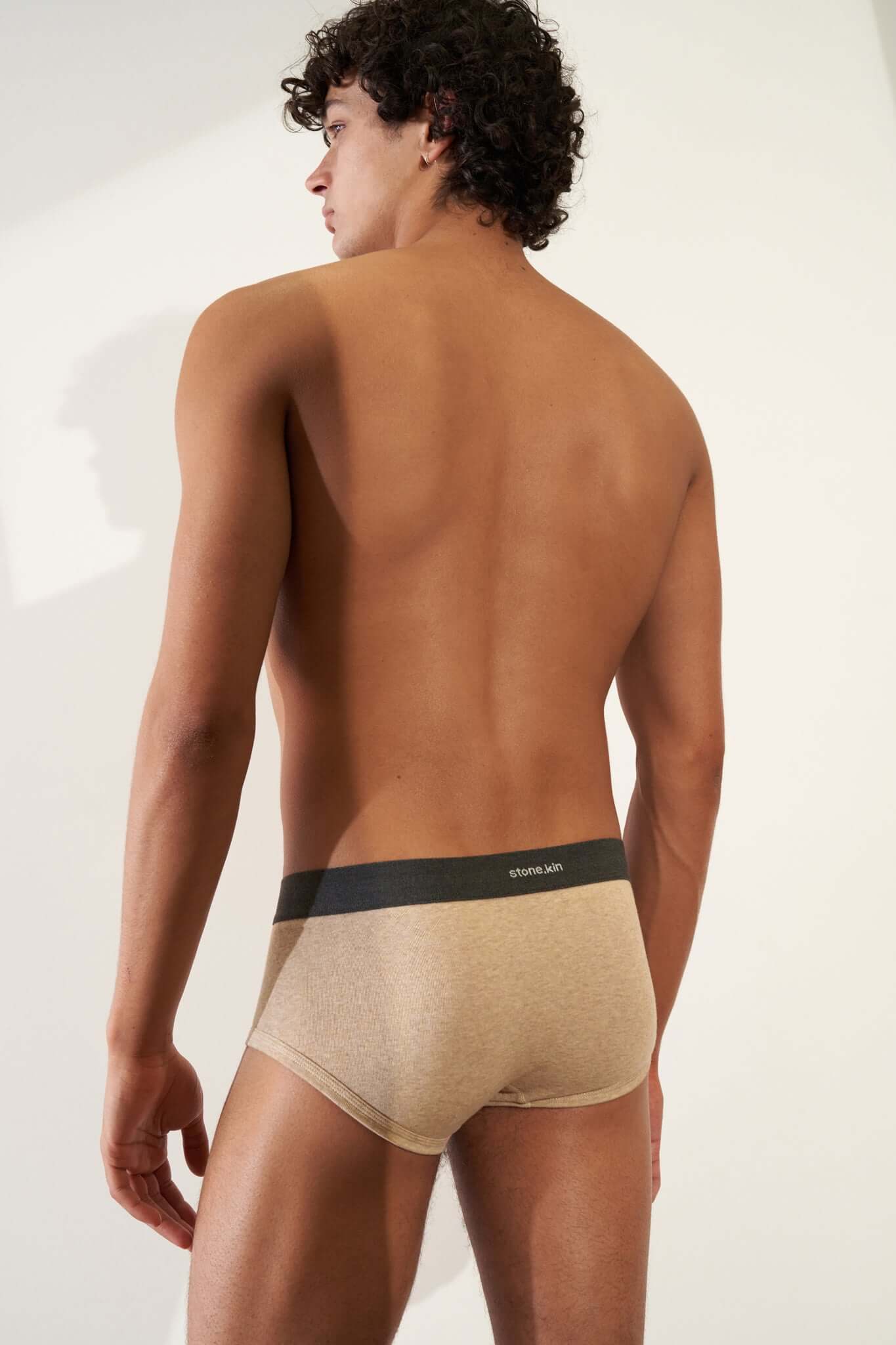 Stonekin Men's Organic Cotton Trunk 3-Pack in Mustard, Sand, and Tar colours, crafted for comfort and breathability. Ethically made from premium organic cotton.